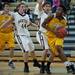 Ypsilanti sophomore Avery Williams drives and scores a reverse layup on Friday, Feb. 15. Daniel Brenner I AnnArbor.com